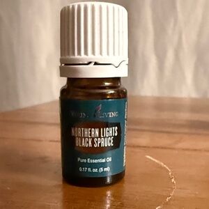 Young Living Northern Lights Black Spruce Essential Oil - Teal and White